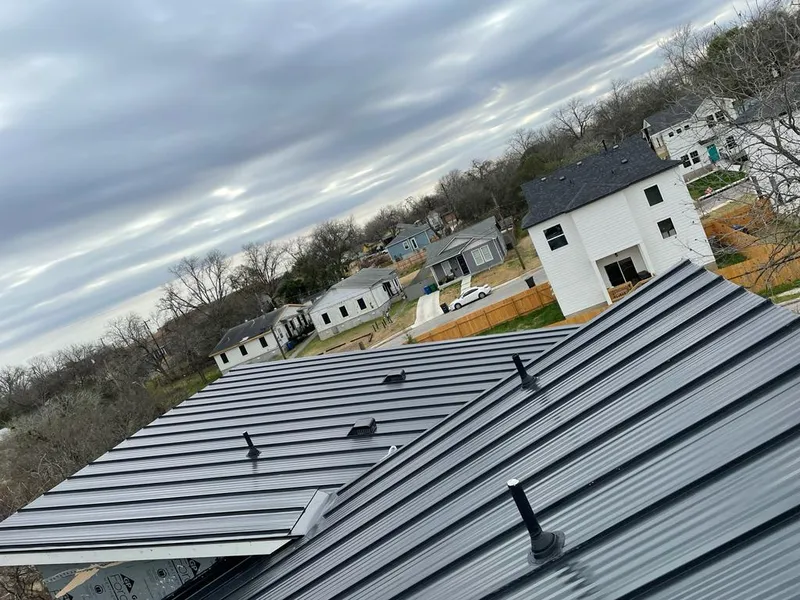 Standing seam metal roof panels with vents for Skylight Repair in Kennebunk